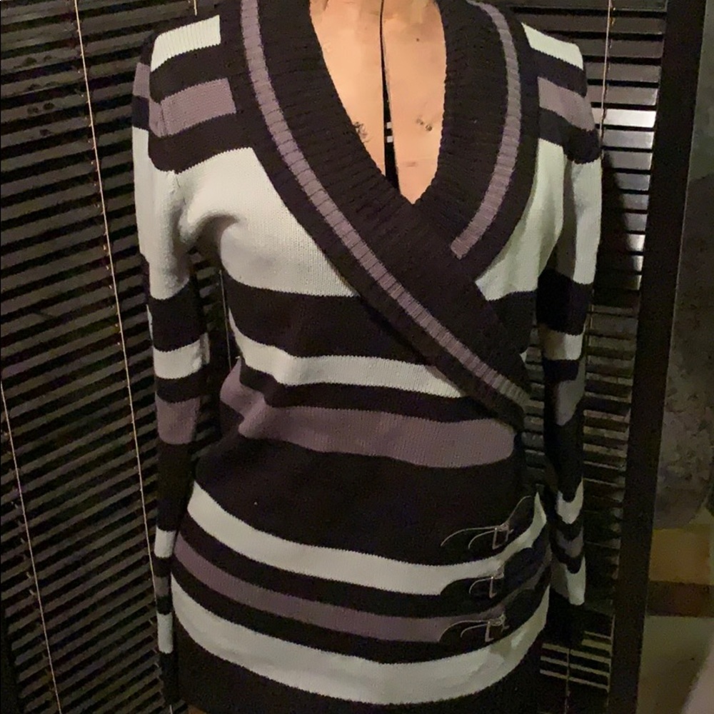Faux wrap sweater with buckles. Stripped. Large.